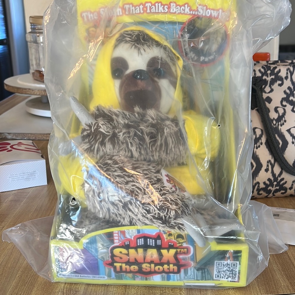 Snax the talking sloth